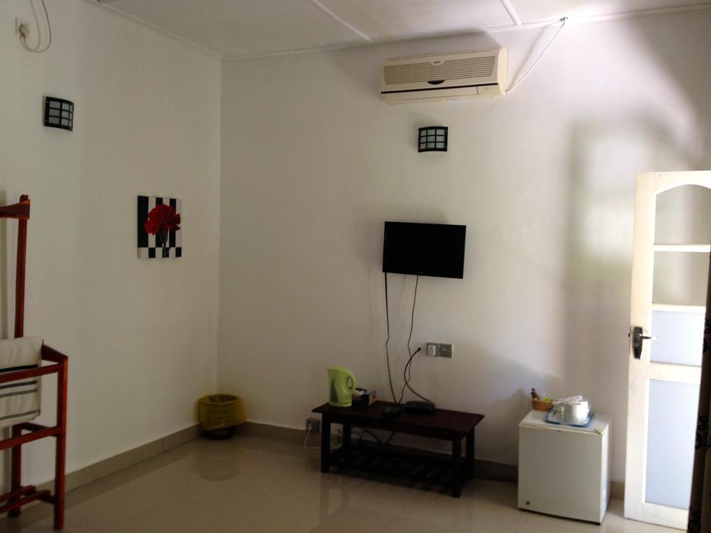 Hotel Fire Dragon Hideaway Negombo Pokoj fotografie