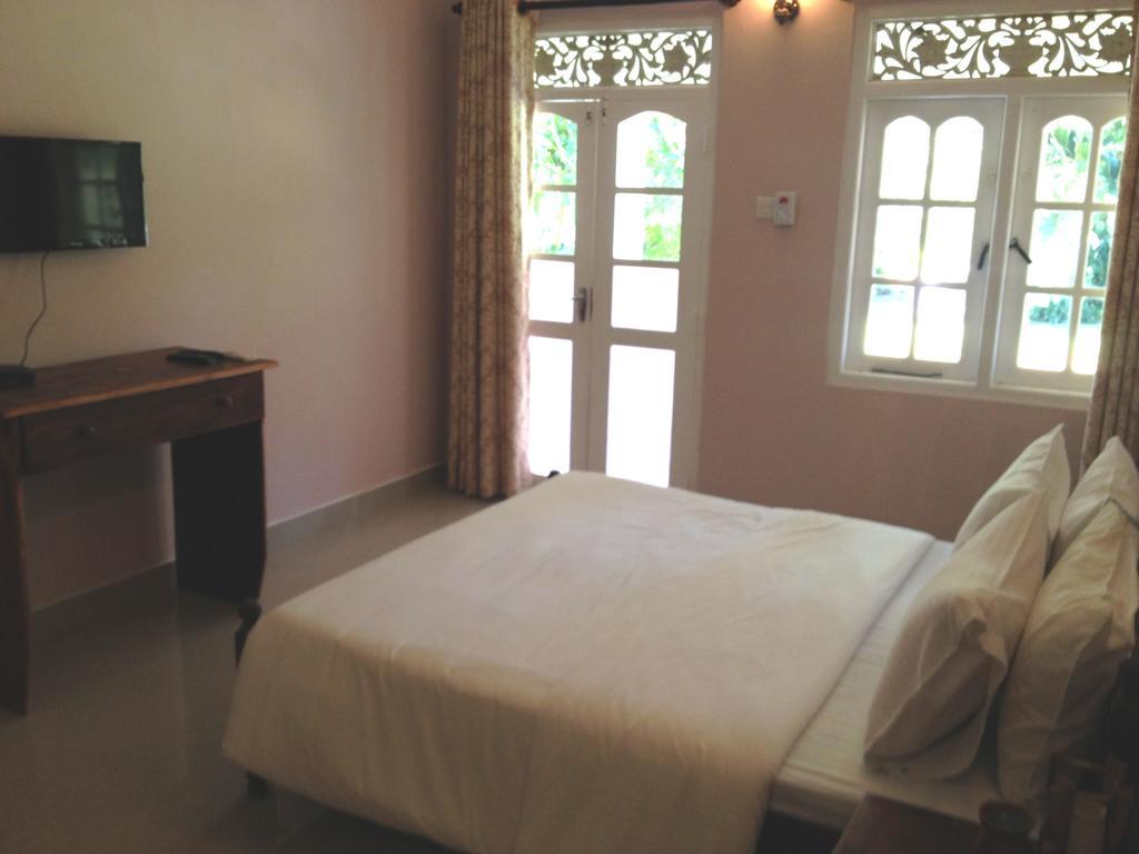 Hotel Fire Dragon Hideaway Negombo Pokoj fotografie
